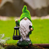 nain de jardin avec une lanterne noir