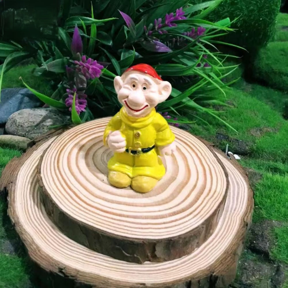 nain de jardin blanche neige qui sourit