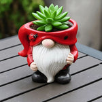 nain de jardin en céramique rouge coccinelle