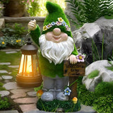 nain de jardin avec lampe solaire
