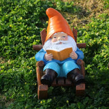 nain de jardin traditionnel bonnet orange avec veste bleu 